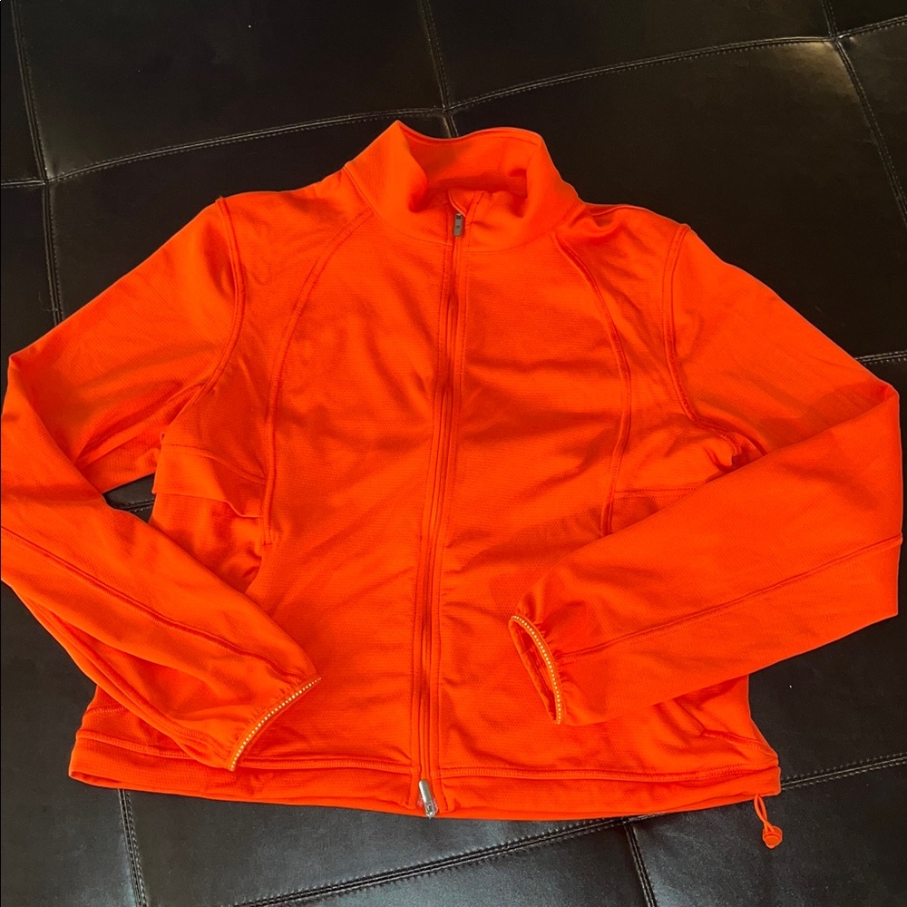 lululemon athletica ventilating UV protection running jacket in solar orange